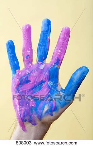A human hand with paint on it View Large Photo Image Stock Image - A human hand with paint on it. Fotosearch