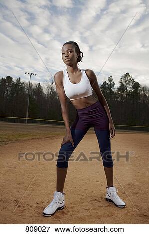 A sportswoman stretching View Large Photo Image Stock Photo - A sportswoman stretching. Fotosearch