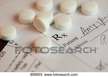 Pills scattered across a prescription View Large Photo Image Stock Image - Pills scattered across a prescription. Fotosearch