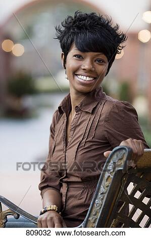 Portrait of a woman smiling View Large Photo Image Stock Image - Portrait of a woman smiling. Fotosearch