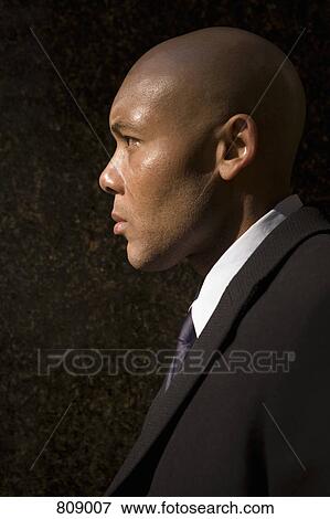 Profile of a businessman View Large Photo Image Stock Photo - Profile of a businessman. Fotosearch