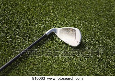 A golf club on grass View Large Photo Image Stock Image - A golf club on grass. Fotosearch