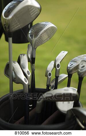 Stock Photograph - Detail of golf clubs in a golf bag. Fotosearch
