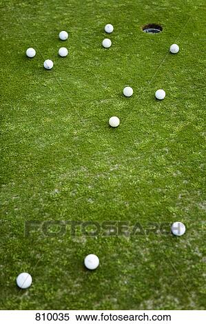 Golf balls on a putting green View Large Photo Image Stock Photography - Golf balls on a putting green. Fotosearch