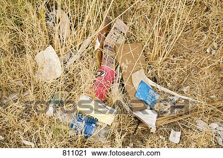 Stock Image - Discarded garbage in nature. Fotosearch