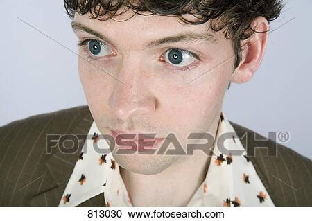 A young man staring View Large Photo Image Stock Image - A young man staring. Fotosearch