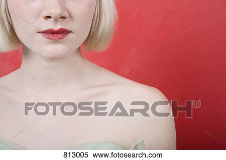 A young woman wearing a strapless vintage dress View Large Photo Image Stock Photography - A young woman wearing a strapless vintage dress. Fotosearch