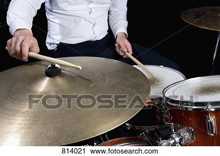 Detail of a man playing drums View Large Photo Image Stock Image - Detail of a man playing drums. Fotosearch