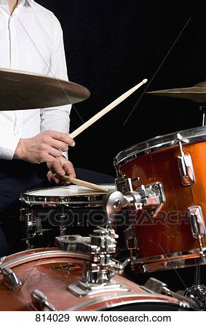 Detail of a man playing drums View Large Photo Image Stock Photo - Detail of a man playing drums. Fotosearch