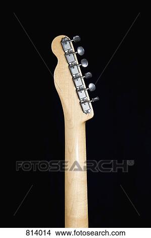 Detail of head and tuning pegs of an electric guitar View Large Photo Image Picture - Detail of head and tuning pegs of an electric guitar. Fotosearch