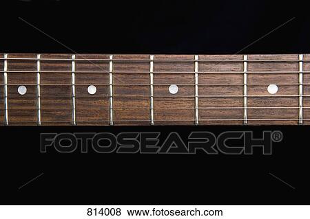 Fretboard of an electric guitar View Large Photo Image Stock Photo - Fretboard of an electric guitar. Fotosearch