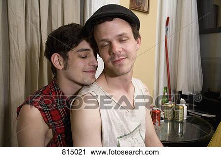 A young couple sitting together with their eyes closed View Large Photo Image Stock Image - A young couple sitting together with their eyes closed. Fotosearch