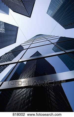 Low angle view of buildings in the financial district, Manhattan, New York City View Large Photo Image Stock Image - Low angle view of buildings in the financial district, Manhattan, New York City. Fotosearch