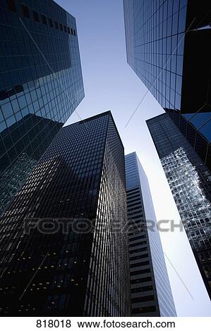Stock Photo - Low angle view of buildings in the financial district, Manhattan, New York City. Fotosearch