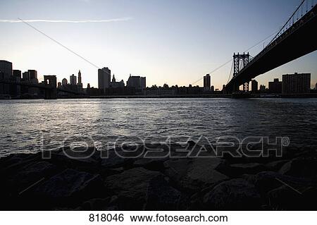 Manhattan Bridge and skyline at sunset, New York City View Large Photo Image Stock Photograph - Manhattan Bridge and skyline at sunset, New York City. Fotosearch