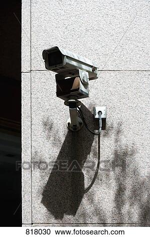 Surveillance camera on the exterior of a building View Large Photo Image Stock Image - Surveillance camera on the exterior of a building. Fotosearch