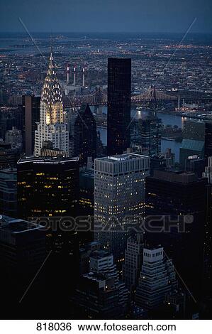 The Chrysler Building and the Brooklyn Bridge in the cityscape at night, New York City View Large Photo Image Stock Photograph - The Chrysler Building and the Brooklyn Bridge in the cityscape at night, New York City. Fotosearch