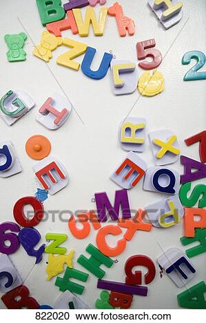 Detail of colorful magnets on a fridge door View Large Photo Image Stock Image - Detail of colorful magnets on a fridge door. Fotosearch