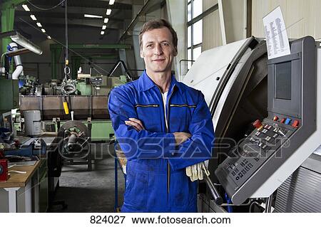 Stock Photo - Portrait of a factory worker. Fotosearch