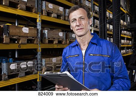 Portrait of a manual worker View Large Photo Image Stock Photo - Portrait of a manual worker. Fotosearch