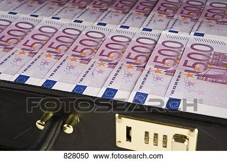 Stock Image - A briefcase full of five hundred euro notes. Fotosearch