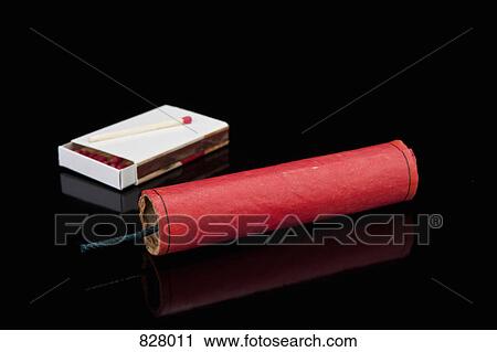 A firecracker and a box of matches View Large Photo Image Stock Image - A firecracker and a box of matches. Fotosearch