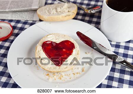 A roll with jam shaped in a heart View Large Photo Image Stock Photo - A roll with jam shaped in a heart. Fotosearch