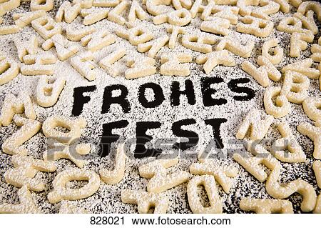 The German phrase Frohes Fest spelled out in powdered sugar View Large Photo Image Stock Image - The German phrase Frohes Fest spelled out in powdered sugar. Fotosearch