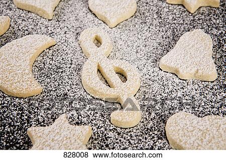 Various shaped cookies with powdered sugar on them View Large Photo Image Stock Photo - Various shaped cookies with powdered sugar on them. Fotosearch