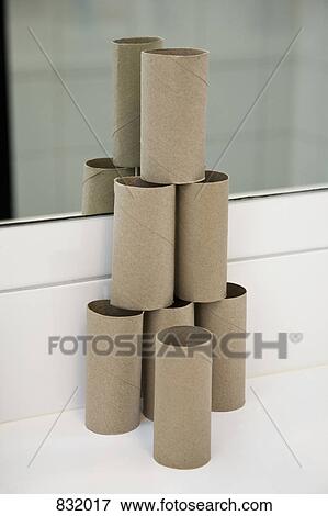 A pyramid shaped stack of empty toilet paper rolls View Large Photo Image Stock Photo - A pyramid shaped stack of empty toilet paper rolls. Fotosearch