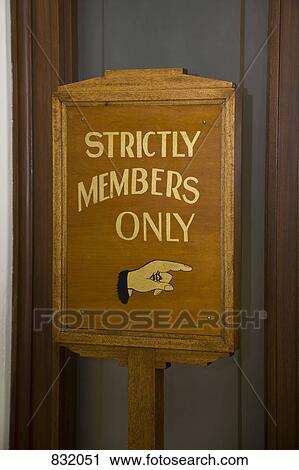 Stock Image - Wooden sign stating STRICTLY MEMBERS ONLY. Fotosearch