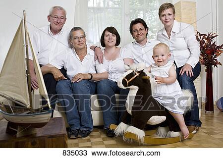 Formal portrait of a multi-generation family View Large Photo Image Stock Image - Formal portrait of a multi-generation family. Fotosearch