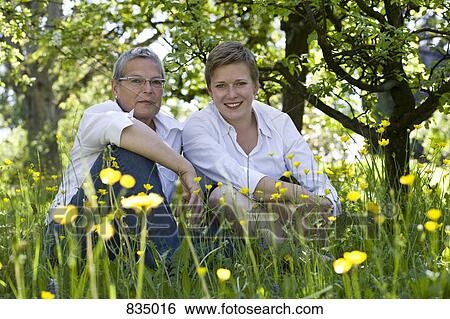 Portrait of a mother and daughter View Large Photo Image Stock Photograph - Portrait of a mother and daughter. Fotosearch