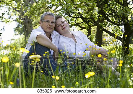 Portrait of a mother and daughter View Large Photo Image Stock Photograph - Portrait of a mother and daughter. Fotosearch