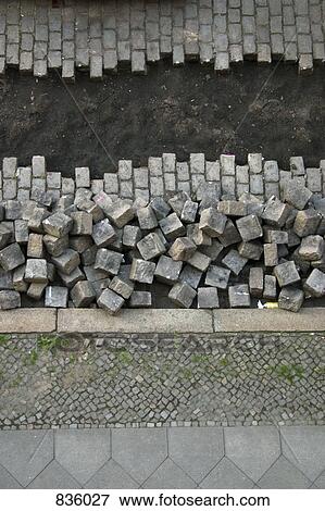 Excavation of a cobblestone street View Large Photo Image Stock Photo - Excavation of a cobblestone street. Fotosearch