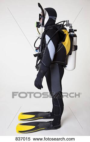 Portrait of scuba diver, side view, studio shot View Large Photo Image Stock Photography - Portrait of scuba diver, side view, studio shot. Fotosearch