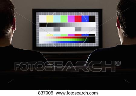 Two men watching a test pattern on a television View Large Photo Image Stock Photograph - Two men watching a test pattern on a television. Fotosearch