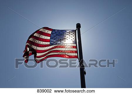 American flag flying View Large Photo Image Stock Image - American flag flying. Fotosearch