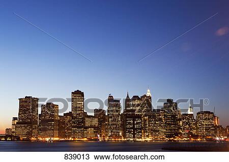 Cityscape at dusk, Manhattan, New York City, NY, USA View Large Photo Image Stock Image - Cityscape at dusk, Manhattan, New York City, NY, USA. Fotosearch
