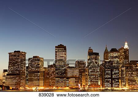 Stock Photo - Cityscape at dusk, Manhattan, New York City, NY, USA. Fotosearch