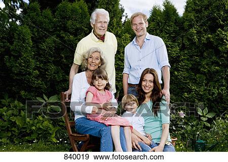 Portrait of a multi-generational family View Large Photo Image Stock Photo - Portrait of a multi-generational family. Fotosearch