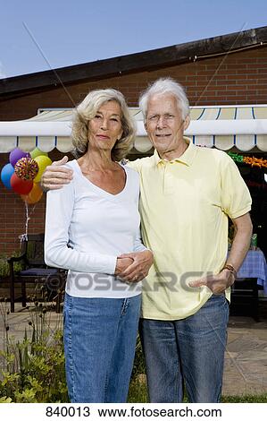 Portrait of a senior couple, outdoors View Large Photo Image Stock Image - Portrait of a senior couple, outdoors. Fotosearch