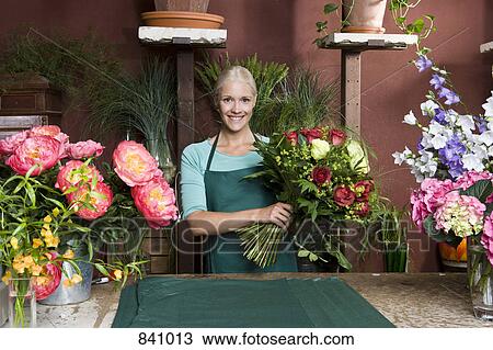 Portrait of a florist View Large Photo Image Stock Image - Portrait of a florist. Fotosearch