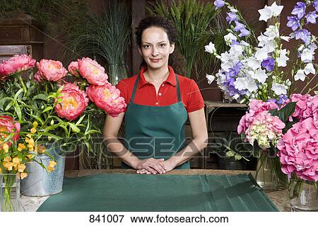 Portrait of a florist View Large Photo Image Stock Photo - Portrait of a florist. Fotosearch