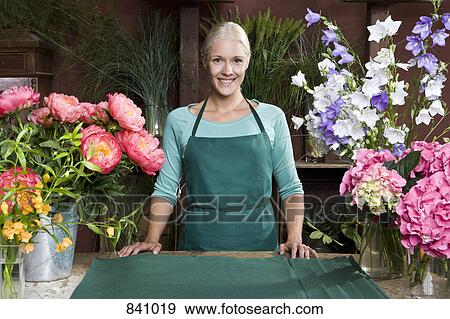 Portrait of a florist View Large Photo Image Stock Photo - Portrait of a florist. Fotosearch