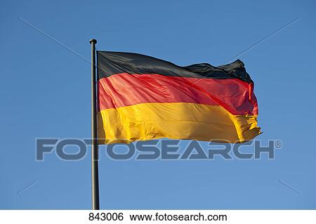 A German flag on a flag pole View Large Photo Image Stock Photograph - A German flag on a flag pole. Fotosearch