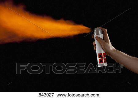 A hand spraying flames from an aerosol can, studio shot View Large Photo Image Stock Photo - A hand spraying flames from an aerosol can, studio shot. Fotosearch