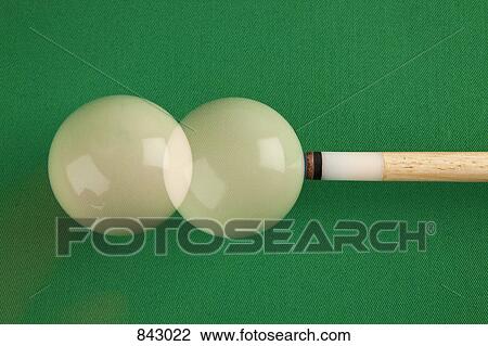 A pool cue and a cue ball on a pool table, multiple exposure View Large Photo Image Stock Image - A pool cue and a cue ball on a pool table, multiple exposure. Fotosearch