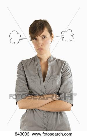 Stock Image - A young woman with drawings of steam coming out of her ears. Fotosearch