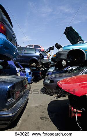 Cars in a junkyard View Large Photo Image Stock Image - Cars in a junkyard. Fotosearch